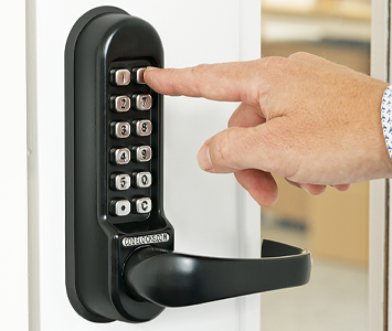 Office door featuring a digital door lock